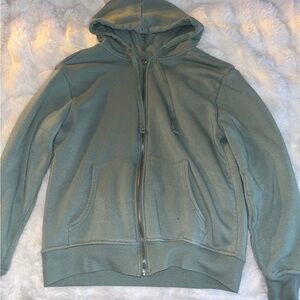 green zip up